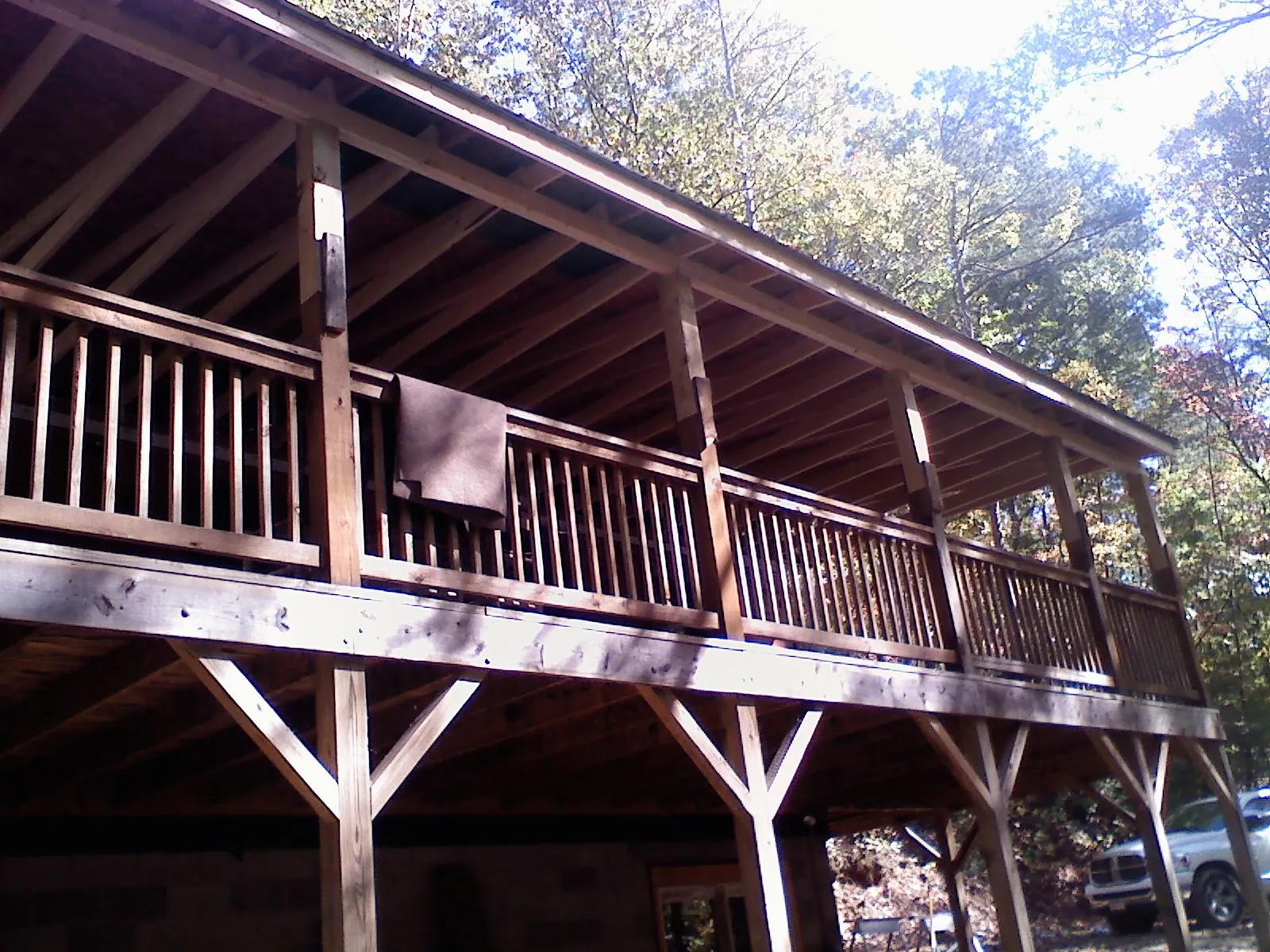 Timber framing under a new elevated porch and deck — Roof Leak Repair in Stratford by Roofing Brothers